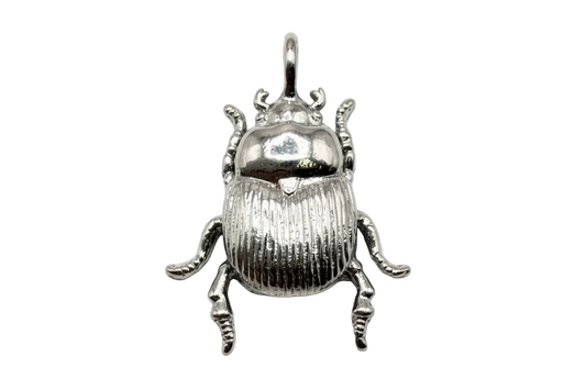 Polished silver scarab beetle charm with ribbed texture and detailed legs