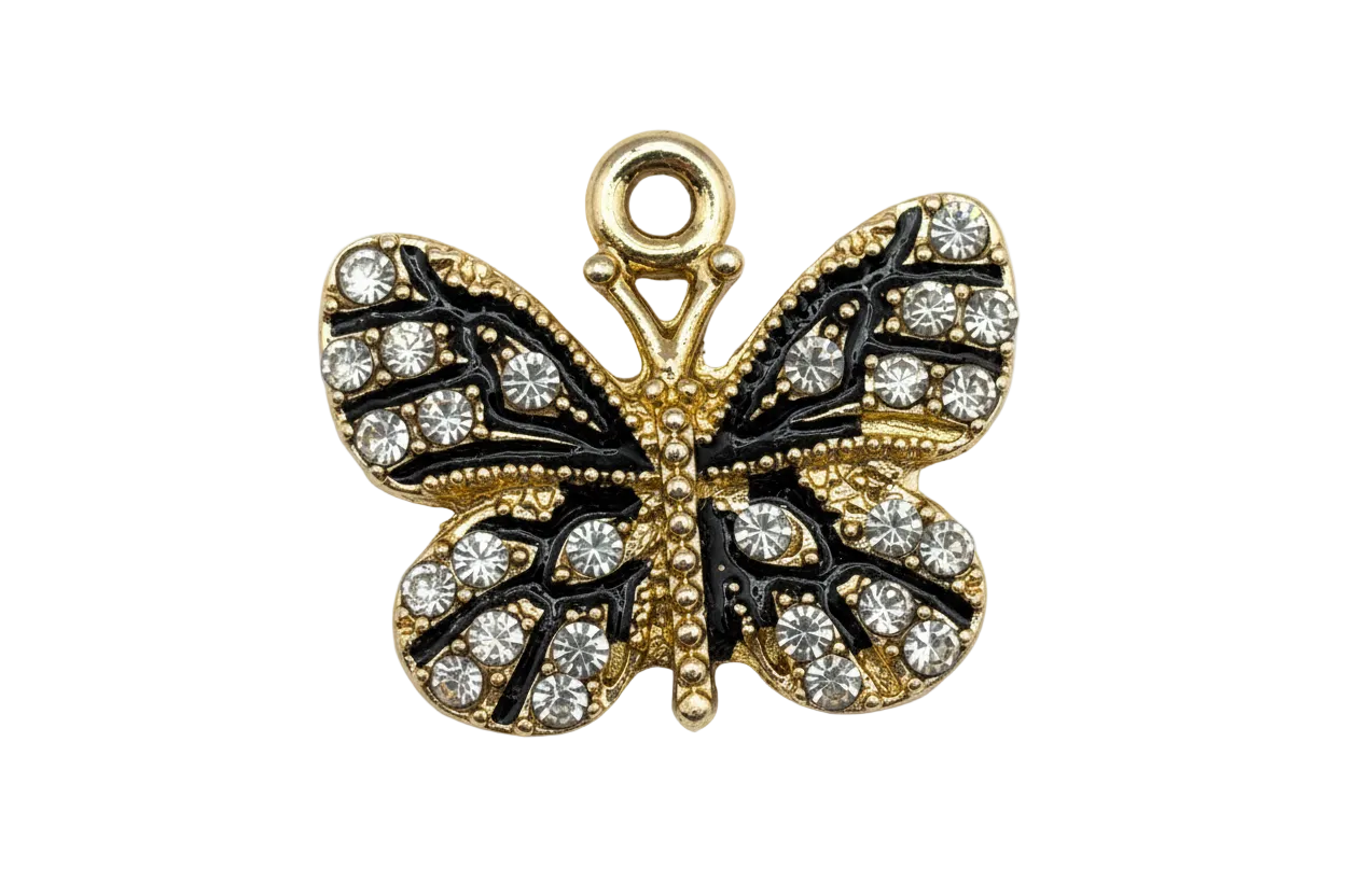 Gold butterfly charm with black enamel and clear pavé crystals
