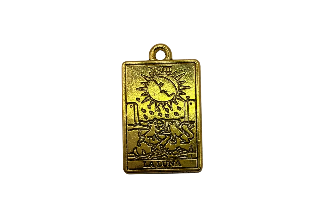 Gold rectangular moon tarot card charm with engraved wolves, crescent moon, and "LA LUNA" text