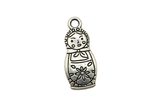 Antiqued silver nesting doll charm with engraved flower and scarf details