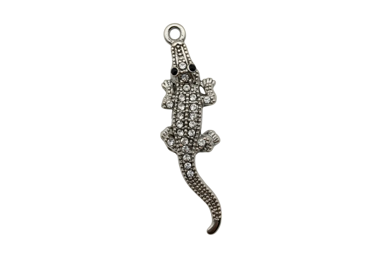 Silver pavé crocodile pendant with clear stones and black eyes