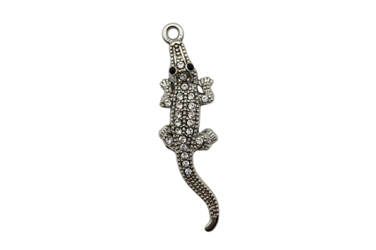 Silver pavé crocodile pendant with clear stones and black eyes