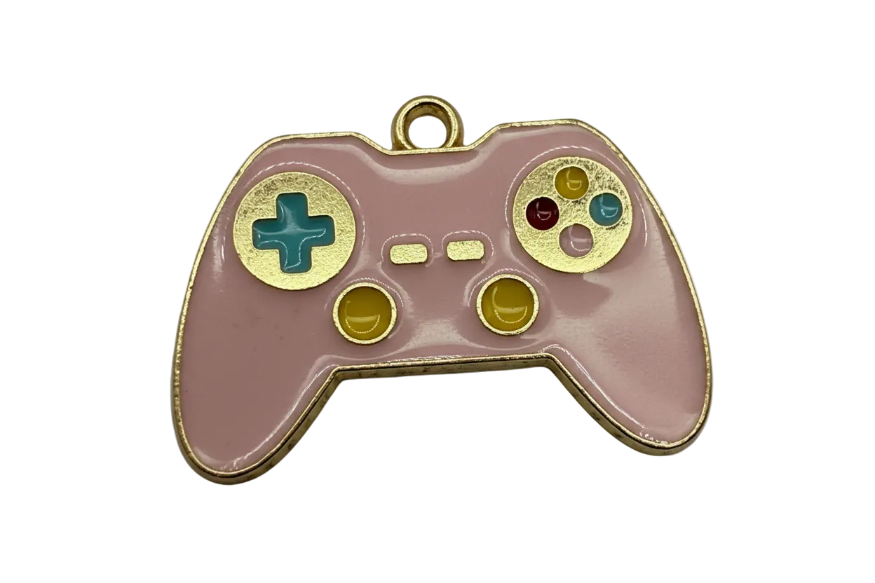 Blush pink enamel game controller charm with gold outline and multicolor buttons