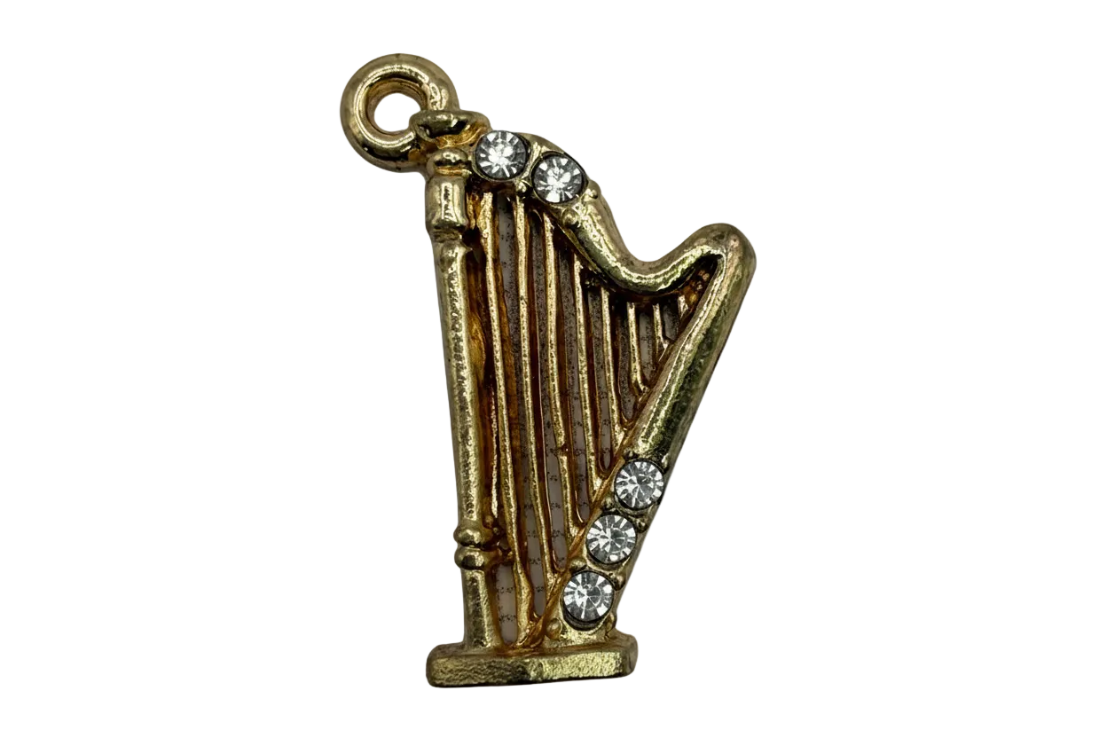 Gold harp charm with clear crystal accents and detailed strings