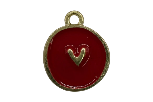 Crimson enamel round medallion with raised gold heart detail and gold rim