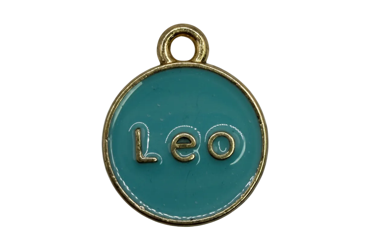 Teal enamel round disc with raised gold "Leo" lettering and gold border