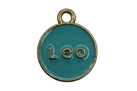 Teal enamel round disc with raised gold "Leo" lettering and gold border