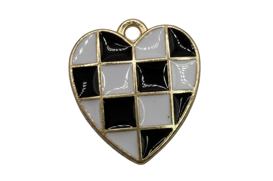 Gold heart with black and white checkerboard enamel panels, glossy finish