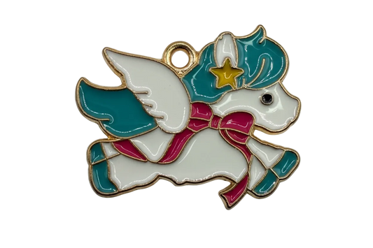 Gold-toned enamel winged unicorn with teal mane, magenta scarf, gold star detail, and clear gem accent