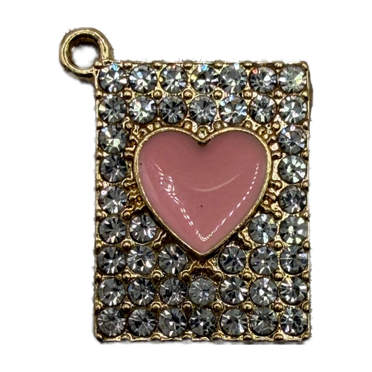 Gold rectangular pavé piece with clear crystals and a glossy pink heart center