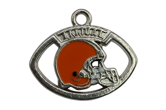 Antique-silver football-shaped emblem with orange enamel football helmet detail