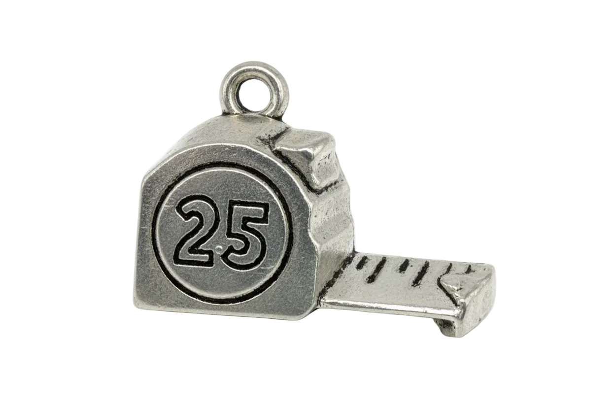 Antique silver tape measure charm with engraved 25 and extended measuring strip