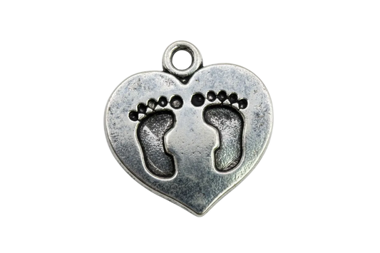 Antiqued silver heart with baby footprints detail