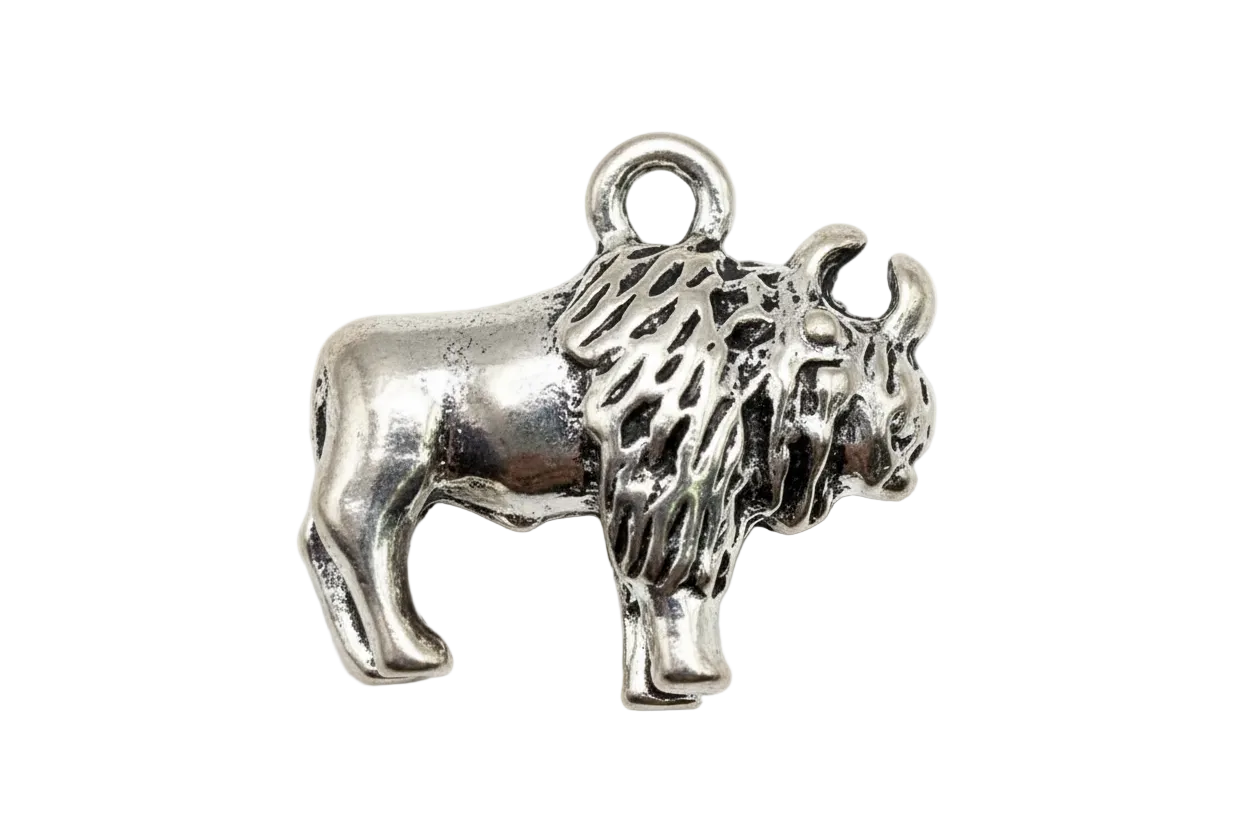Antiqued silver shaggy terrier dog figure with raised tail and textured fur