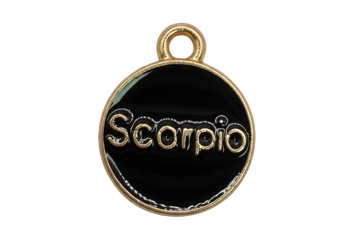Black enamel round Scorpio zodiac medallion with raised gold lettering and gold border