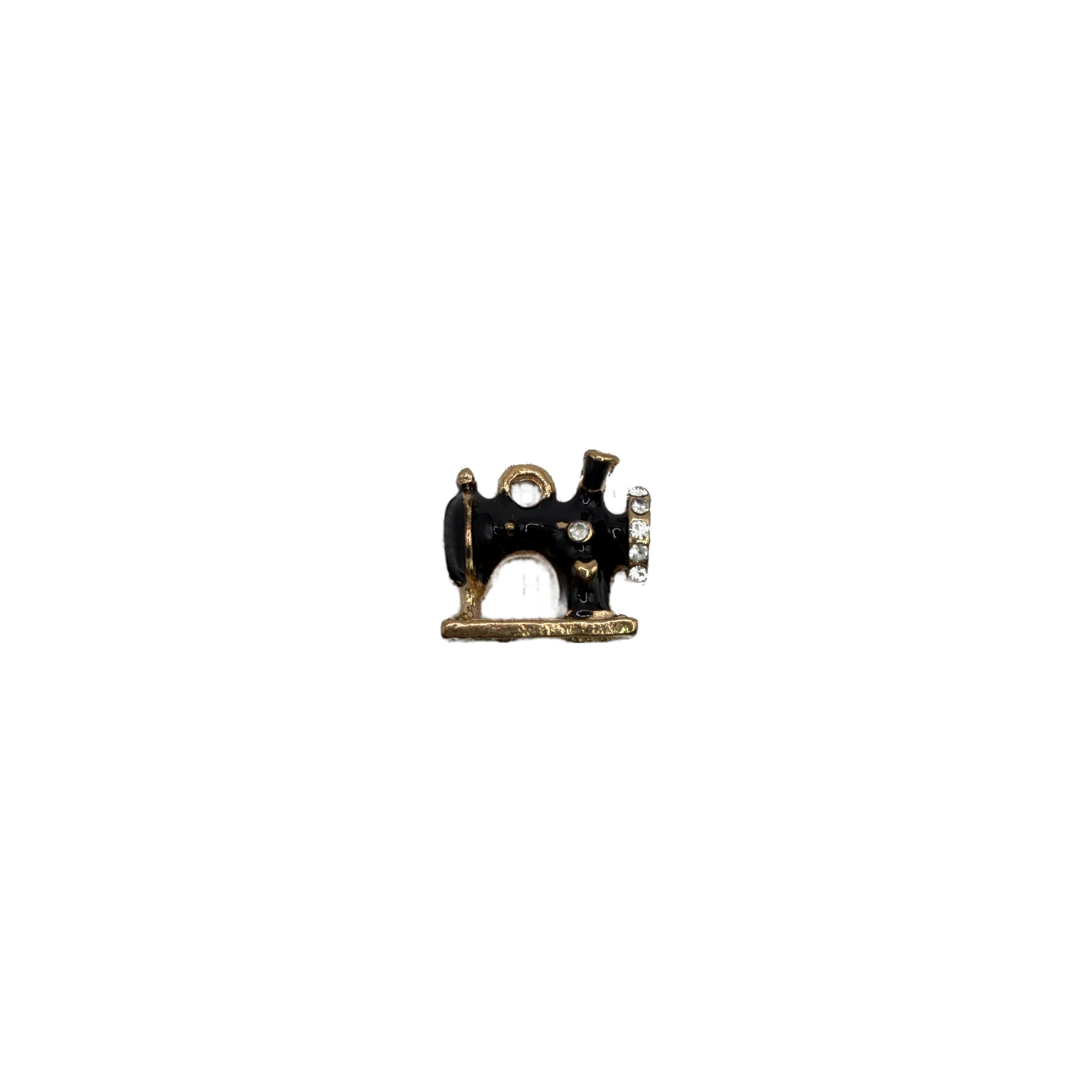 Black enamel sewing machine in gold with clear crystals