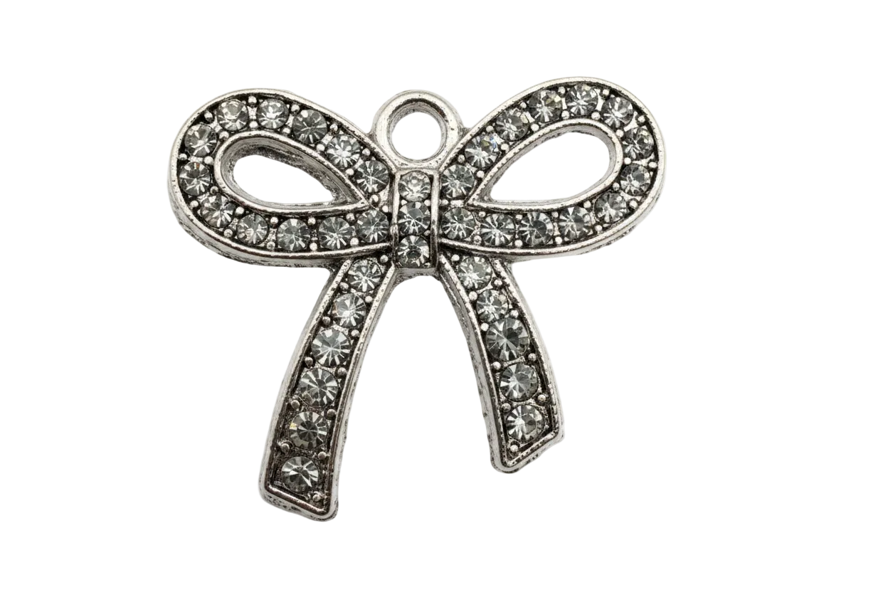Silver ribbon bow charm with clear pavé crystals and oxidized detailing