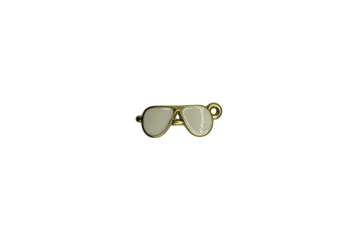 Gold musical note with glossy white enamel