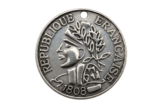 Antiqued silver coin medallion with raised profile, laurel branch, and French lettering