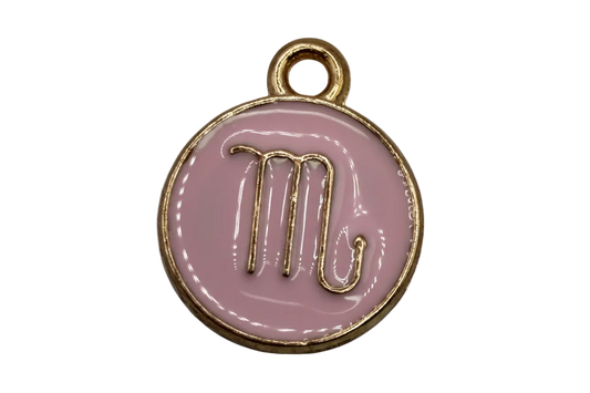 Round blush pink enamel disc with raised gold script letter M and gold rim