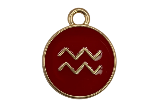 Glossy red round medallion with raised gold Aquarius zodiac symbol and gold border