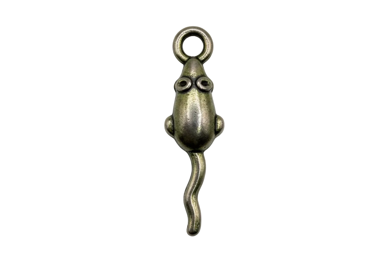 Silver tadpole-shaped charm with rounded body, long tail, and subtle antiqued finish on black background