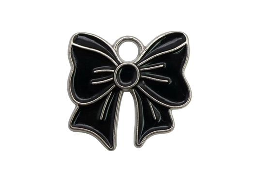Glossy black flower charm with silver-tone outline and small white cabochon accent