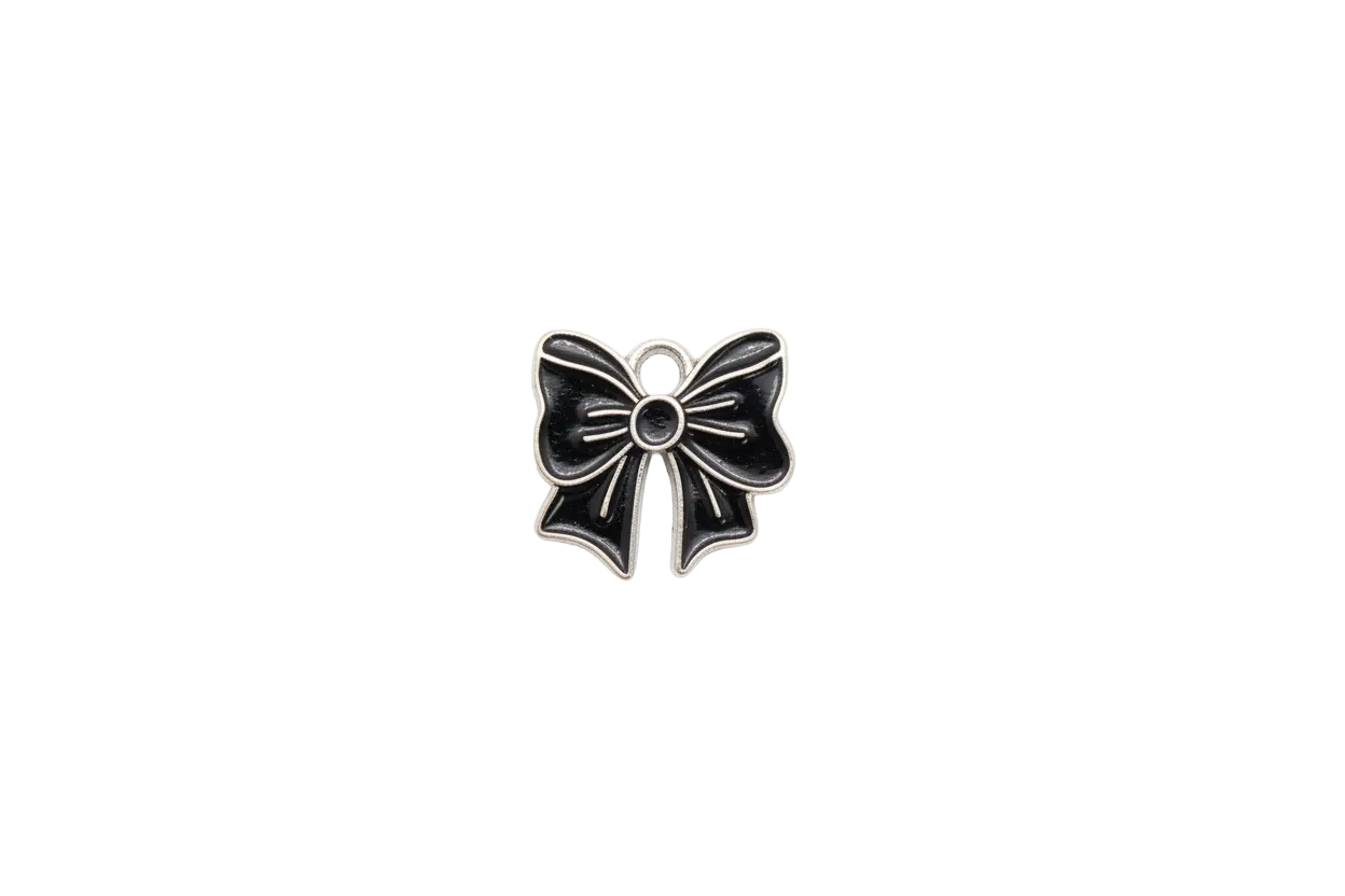 Black flower with silver-tone outline and white cabochon