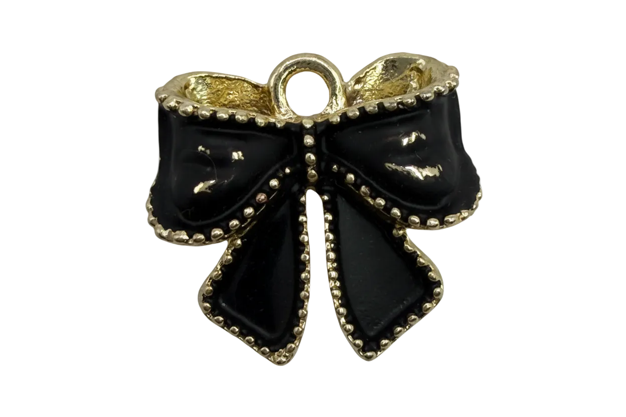 Glossy black bow charm with beaded gold edging