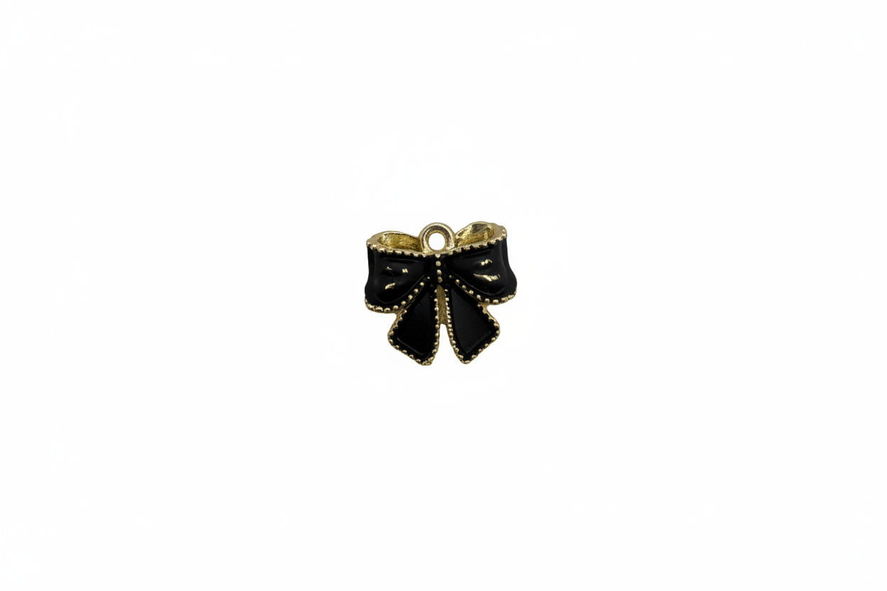 Glossy black bow with beaded gold edging
