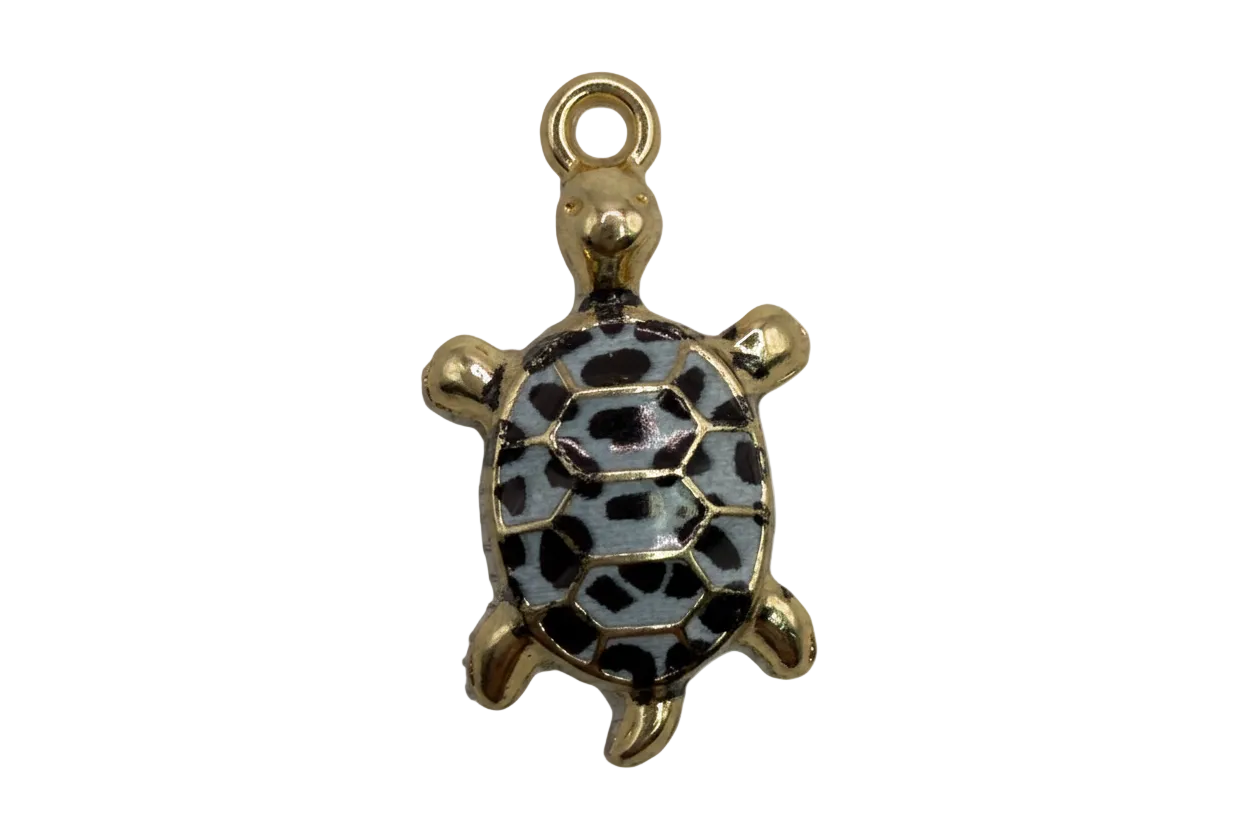 Gold turtle charm with slate-blue enamel shell and black spotted pattern