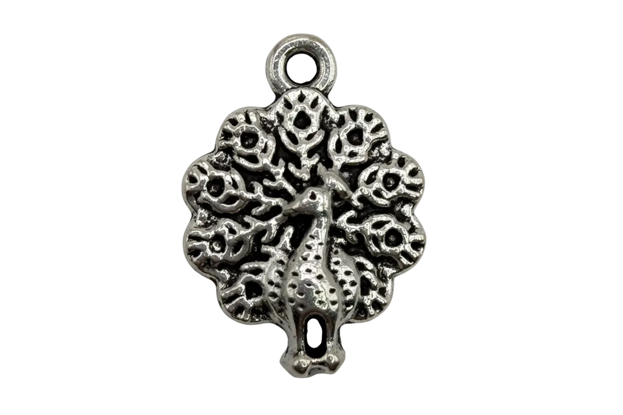 Antiqued silver tree of life medallion with openwork branches and textured detailing