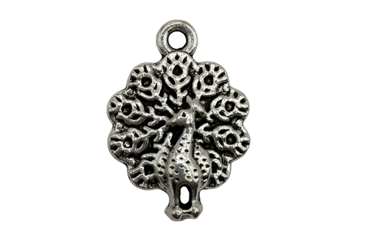 Antiqued silver tree of life medallion with openwork branches and textured detailing