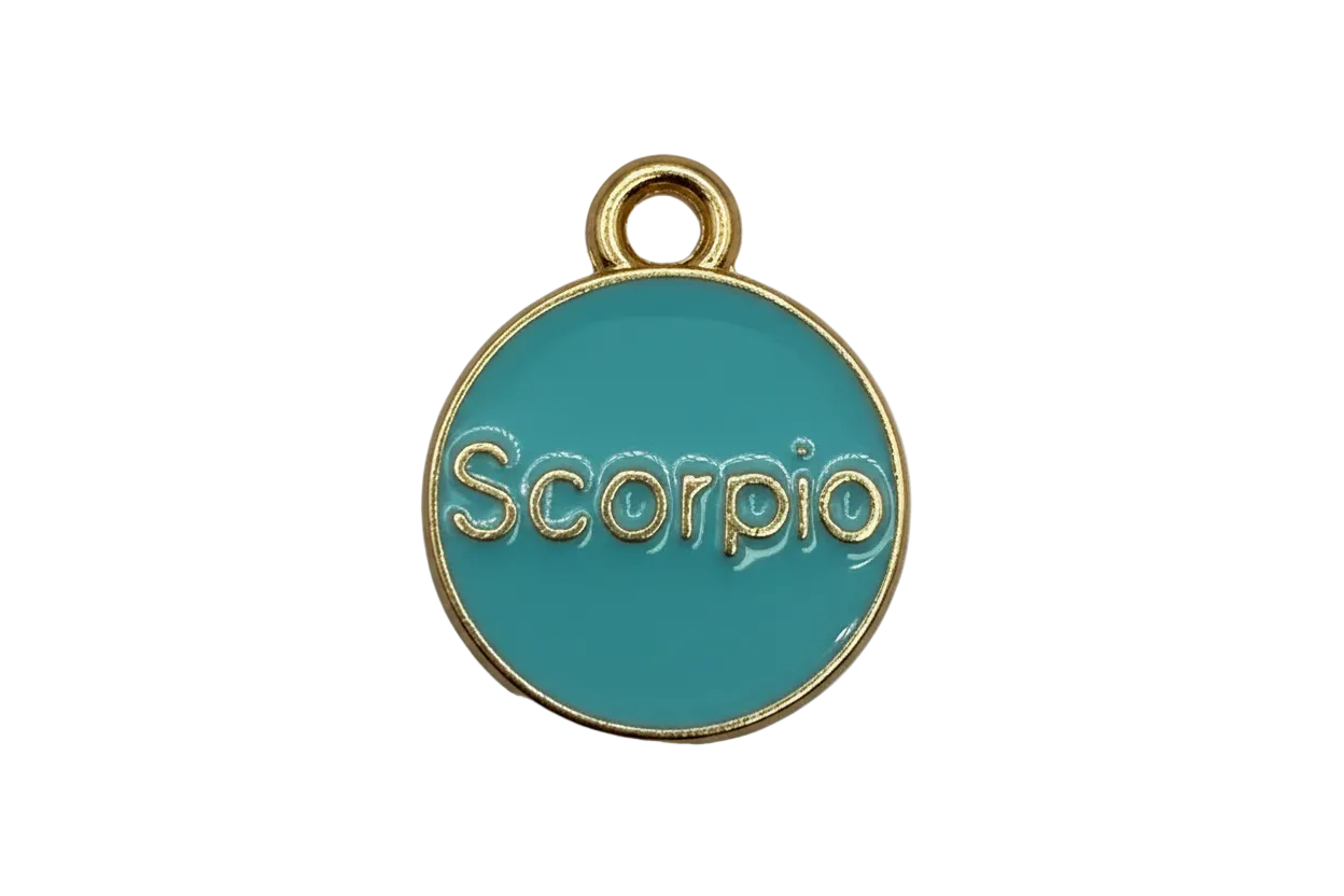 Teal enamel Scorpio zodiac disc with gold border and small clear gem accent