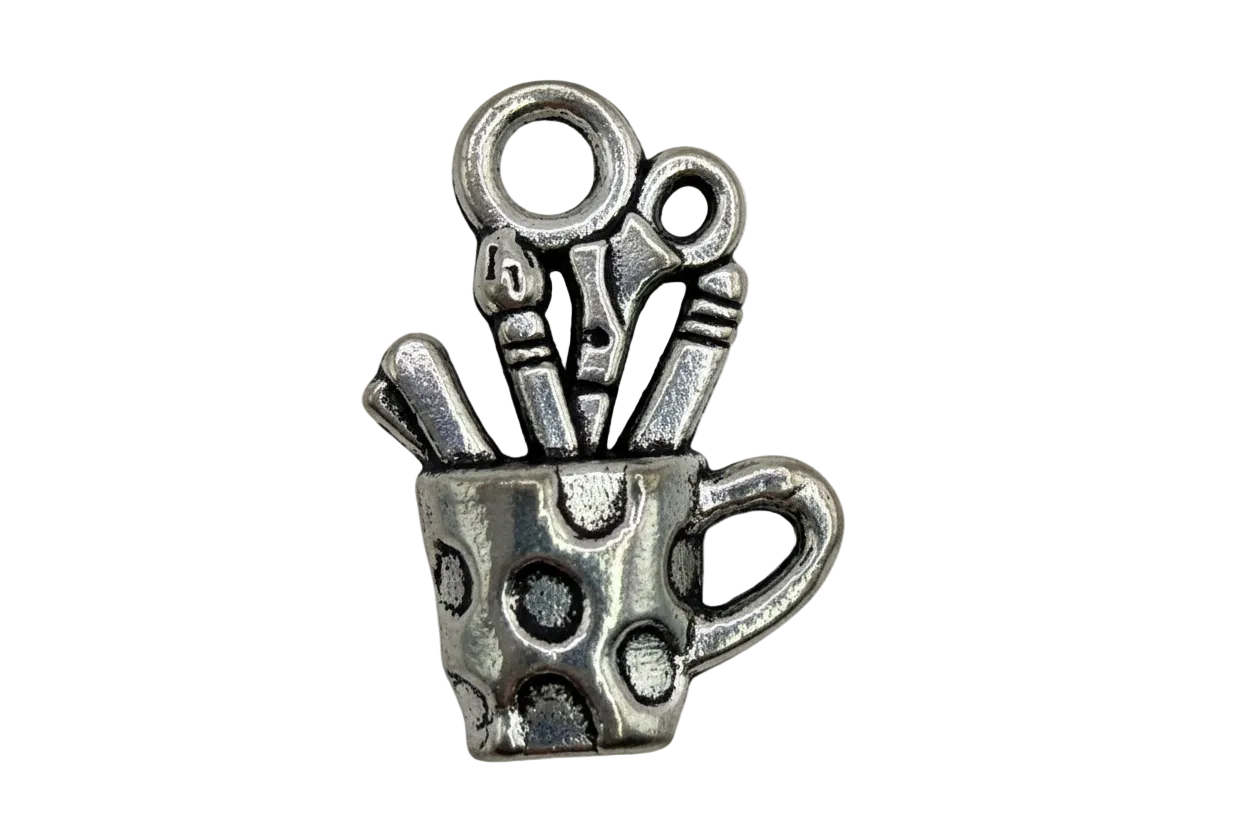 Oxidized silver sewing tools charm featuring scissors and small notions
