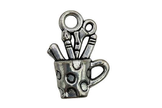 Oxidized silver sewing tools charm featuring scissors and small notions