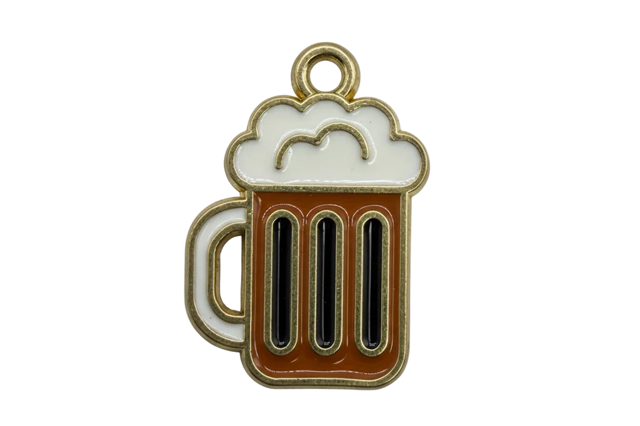Gold-tone foamy beer mug charm with brown enamel body, black stripes, and white foam detail