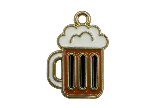 Gold-tone foamy beer mug charm with brown enamel body, black stripes, and white foam detail