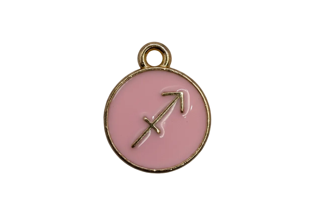 Pink enamel Sagittarius zodiac coin with raised gold arrow symbol and gold border