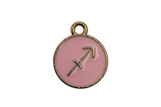 Pink enamel Sagittarius zodiac coin with raised gold arrow symbol and gold border