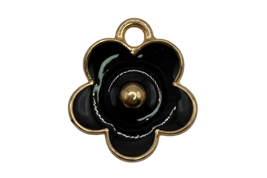Glossy black flower charm with gold outline, gold center bead, and small clear accent gem