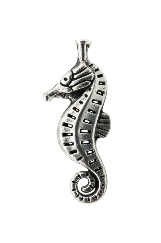 Oxidized silver seahorse charm with cutout detailing and curled tail