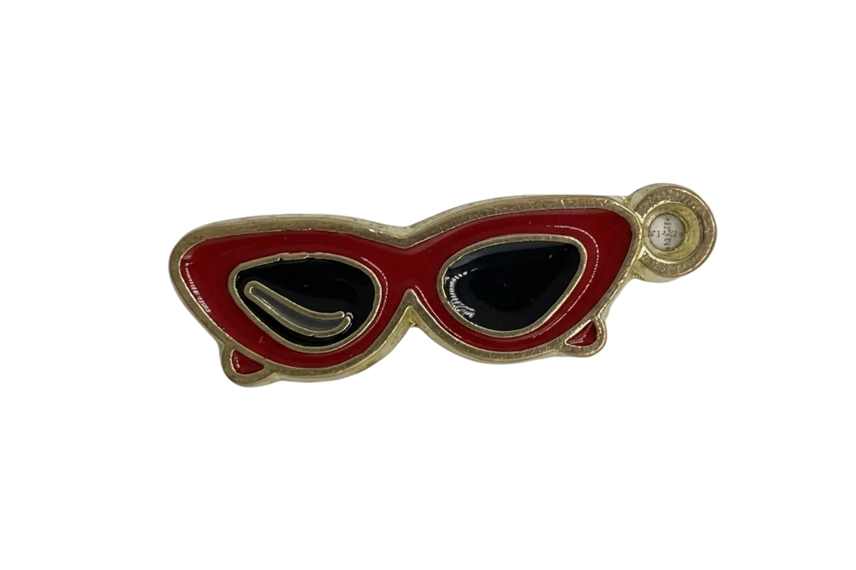 Red cat-eye sunglasses charm with black lenses, gold outline, and a small clear stone accent