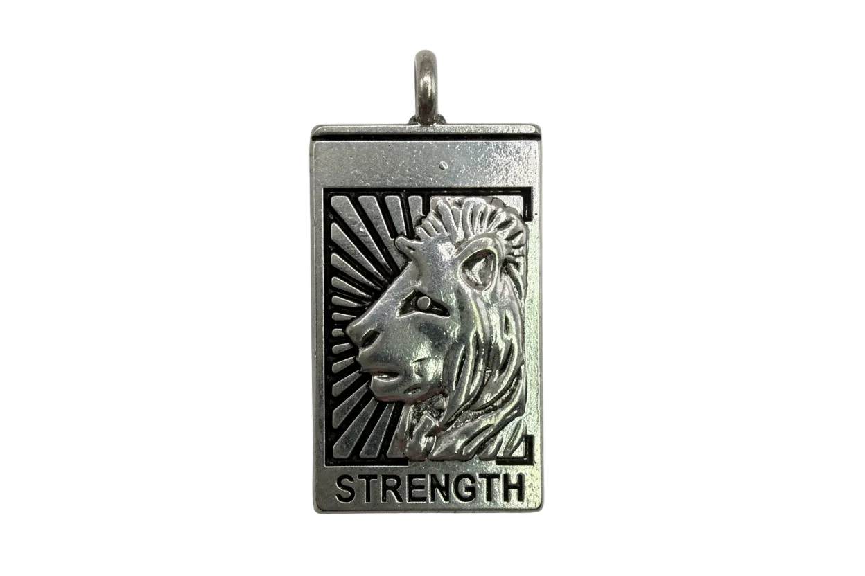 Silver rectangular plaque with raised rhino head, sunburst detail, and “STRENGTH” engraving