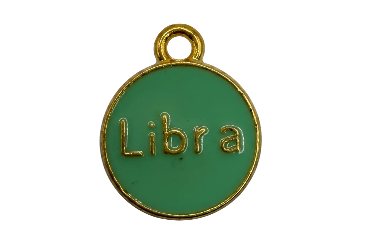 Round green enamel disc with raised gold Libra lettering and gold border