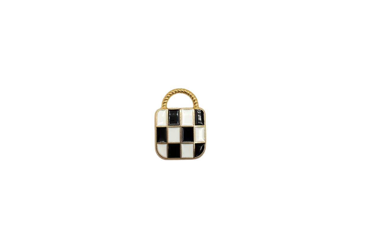 Gold checkered slipper with black and white enamel