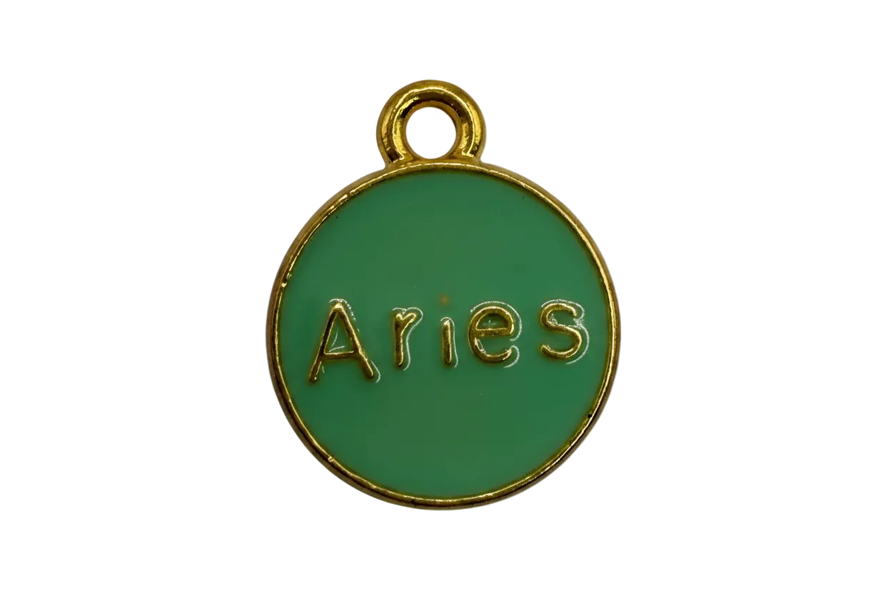 Green enamel Aries medallion with raised gold lettering and gold rim