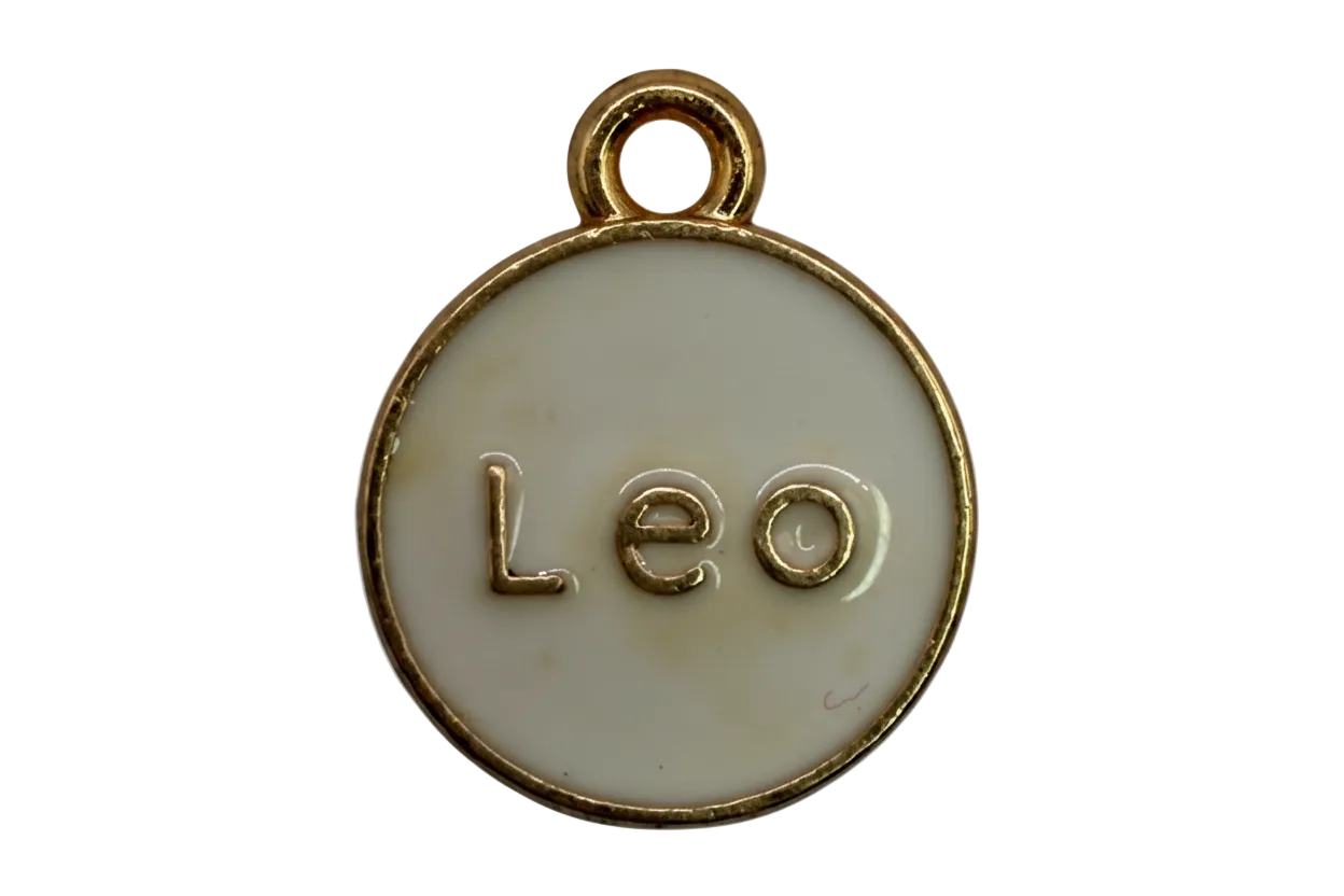 Round white enamel disc with raised gold “Leo” lettering and gold rim