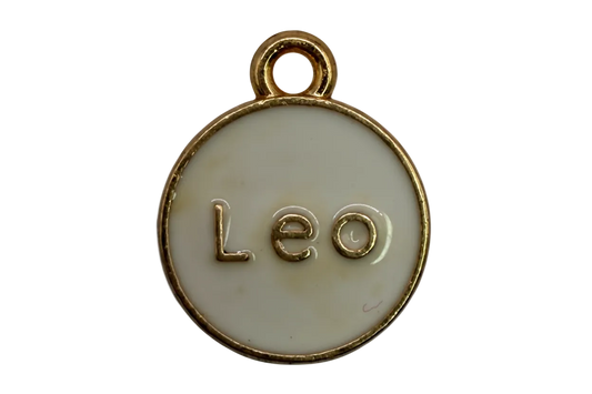 Round white enamel disc with raised gold “Leo” lettering and gold rim
