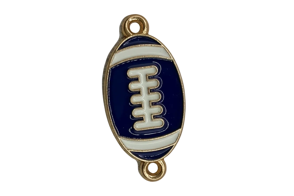 Navy and white enamel football with gold trim and lace detail